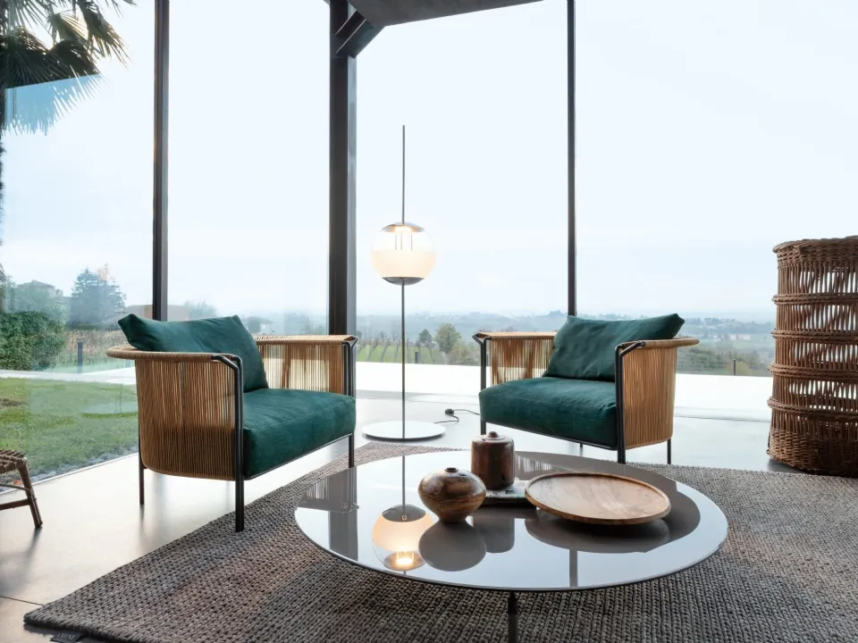 Alton armchair in leather and fabric by Lema