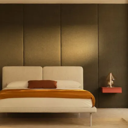 Fabric bed with Face headboard by Bolzan Letti.
