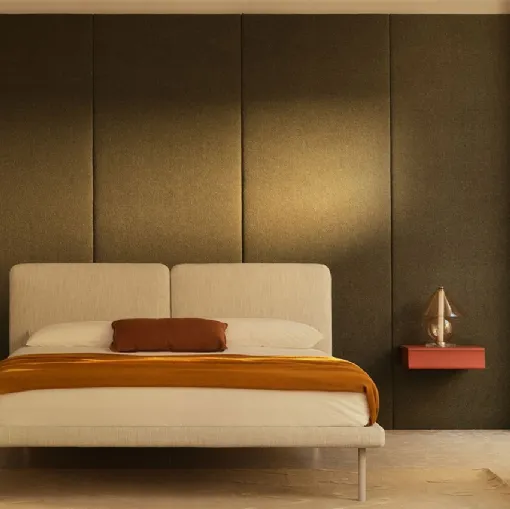Fabric bed with Face headboard by Bolzan Letti.