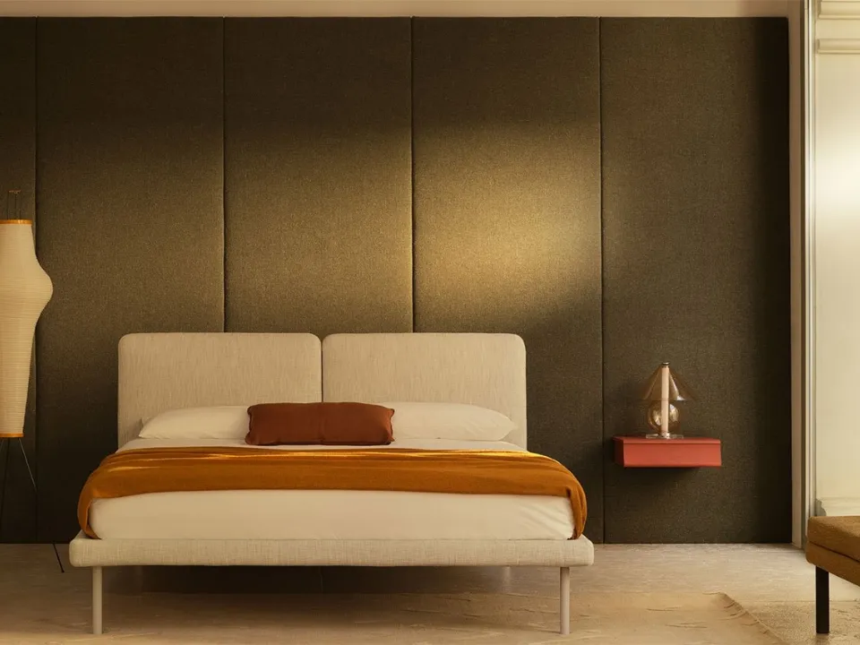 Fabric bed with Face headboard by Bolzan Letti.