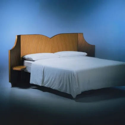 Fiocco Bed with wooden headboard by Bolzan Letti.
