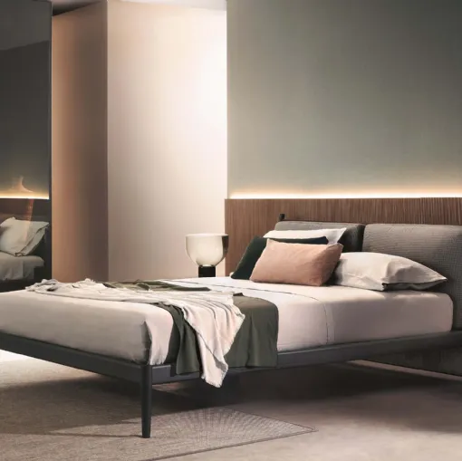 Leather and wood Maddox bed by Lema