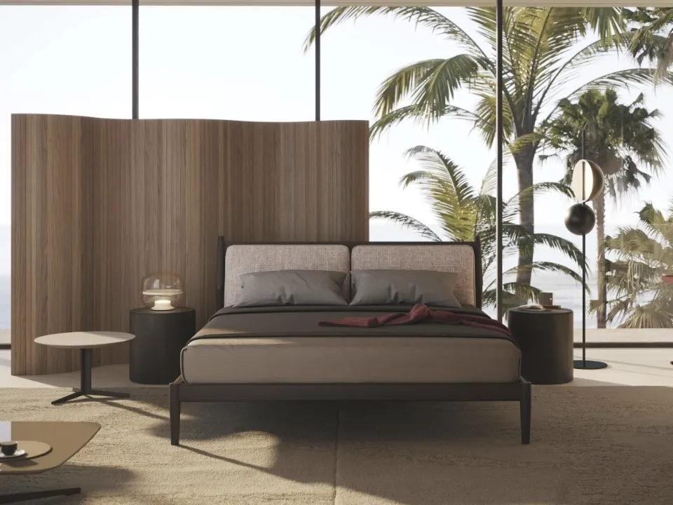 Leather and wood Maddox bed by Lema.