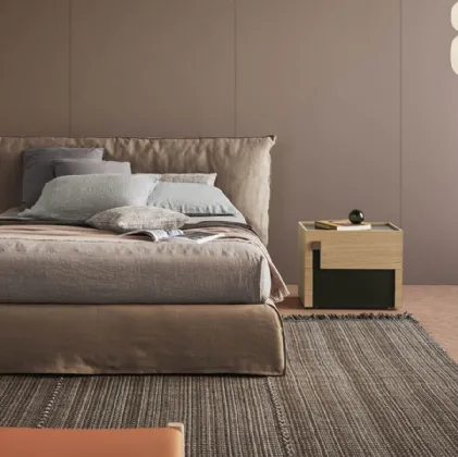 Piumotto upholstered bed by Pianca