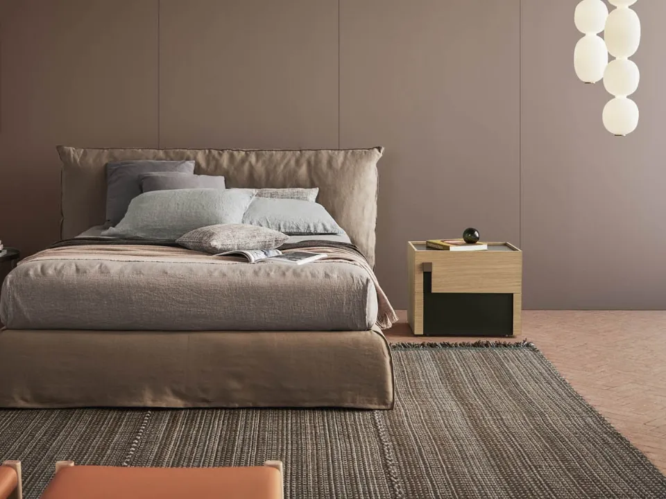 Piumotto upholstered bed by Pianca