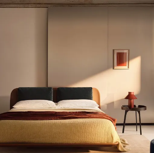 Leather bed Tata by Bolzan Letti.