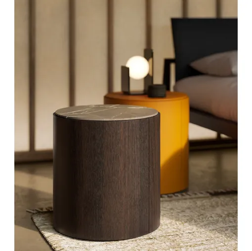 Top nightstand in wood with a marble or lacquered Lema top.