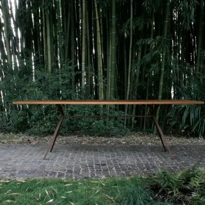 Balance table configuration 06 with solid iroko wood top for outdoor use and corten steel frame by Extendo