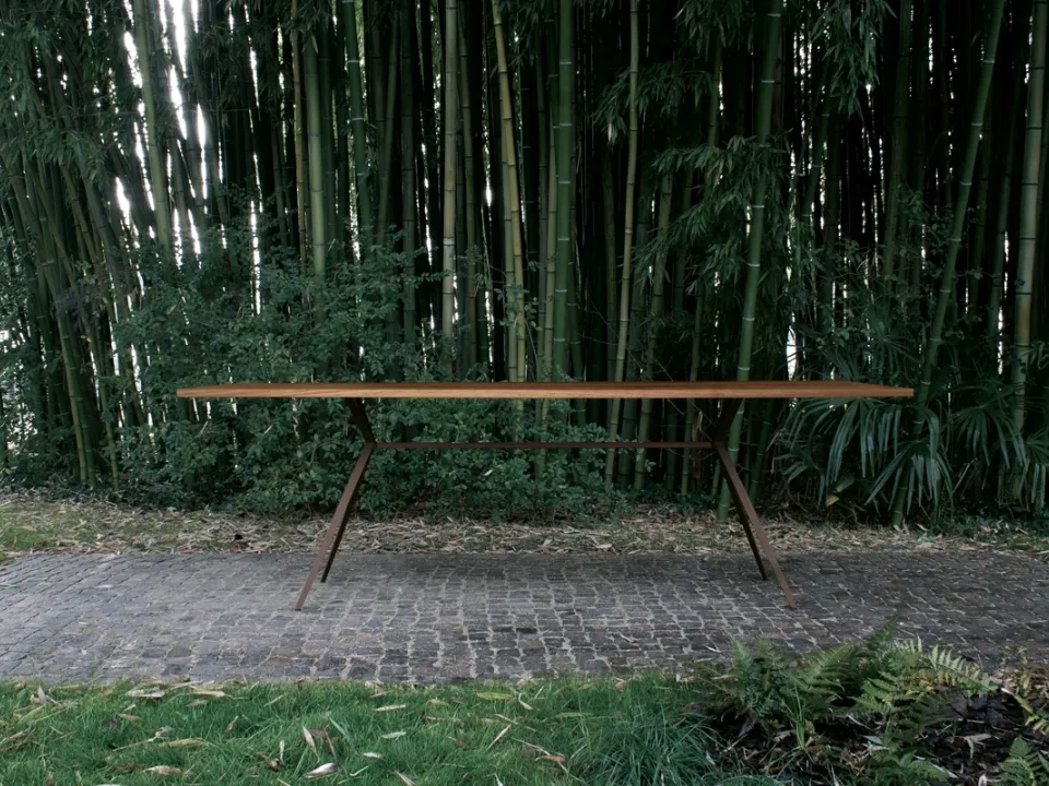 Balance table configuration 06 with solid iroko wood top for outdoor use and corten steel frame by Extendo