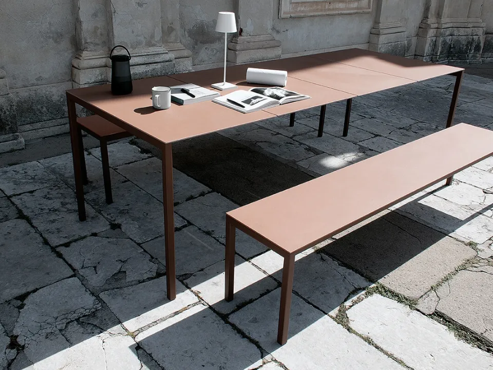 Synthesis table configuration 06 with terracotta ceramic top and corten steel frame by Extendo