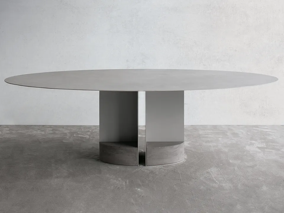 Table T13 configuration 03 with grey ceramic top, steel frame, and cement counterweights by Extendo.